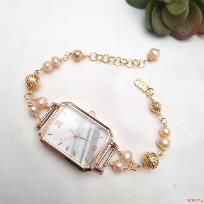 jam tangan wanita elegant, dengan mutiara asli . crom emas