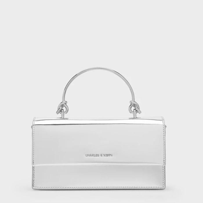 Charles & Keith Tas Tangan Wanita Model Silver Mirror dengan Pegangan Logam Elegan dan Desain Modern