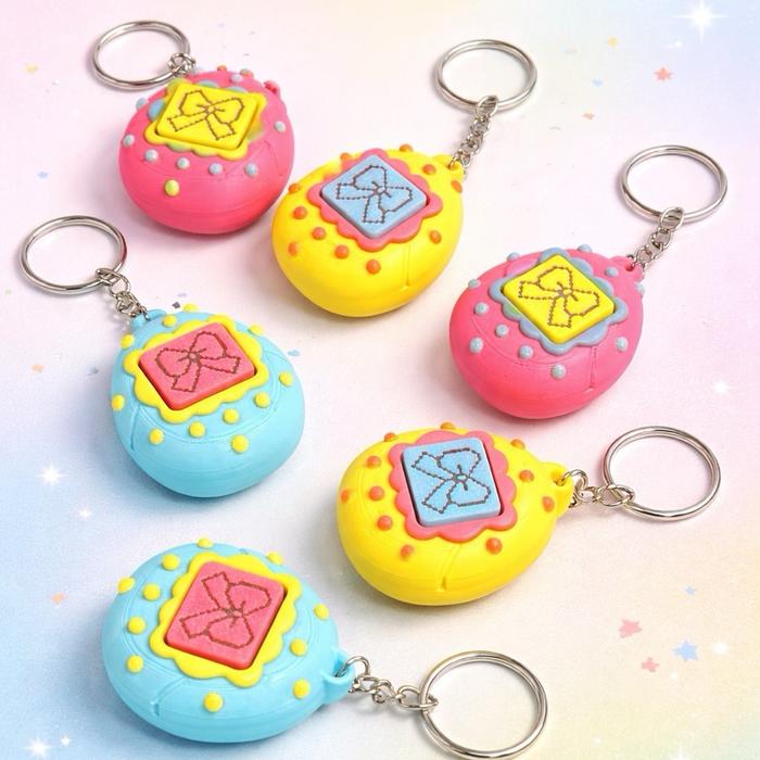 Gantungan kunci “tamagochi” clicker