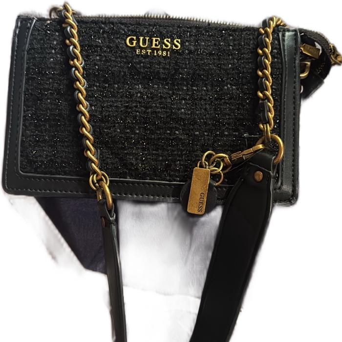 Tas guess preloved ori no kw , minus tapi terkelupas sisanya aman, tinggal direparasi