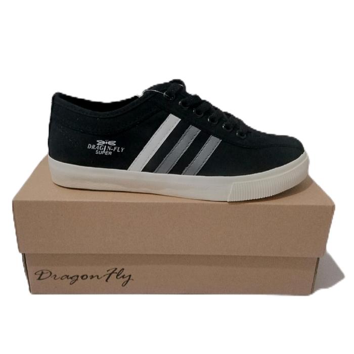 sepatu pria dragon fly hitam putih sneaker nyaman di pakai Karet