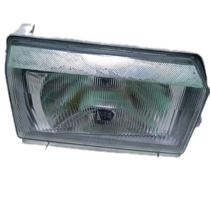 Lampu dpn / head lamp kijang grand kanan, merk Tyc dibagian dpn atas kotor dalam jual murah