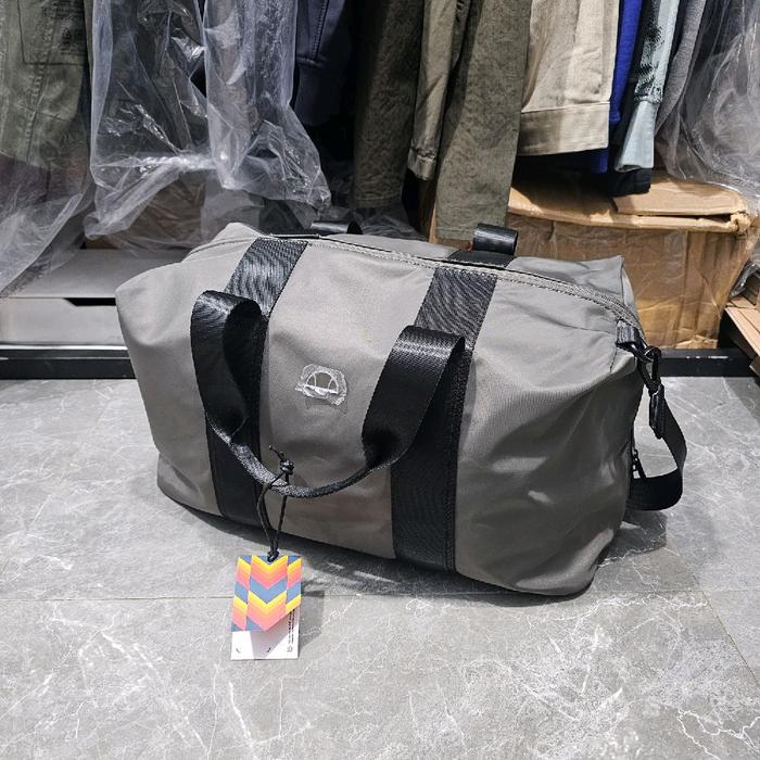 ellesse barrel bag silver