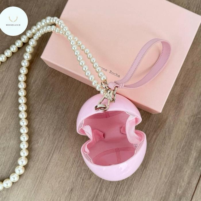 SIMONE ROCHA MICRO PEARL EGG BAG IN PINK