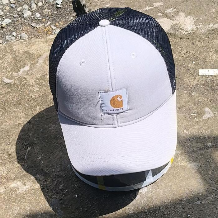 topi truker/jaring keong atau Tutut.