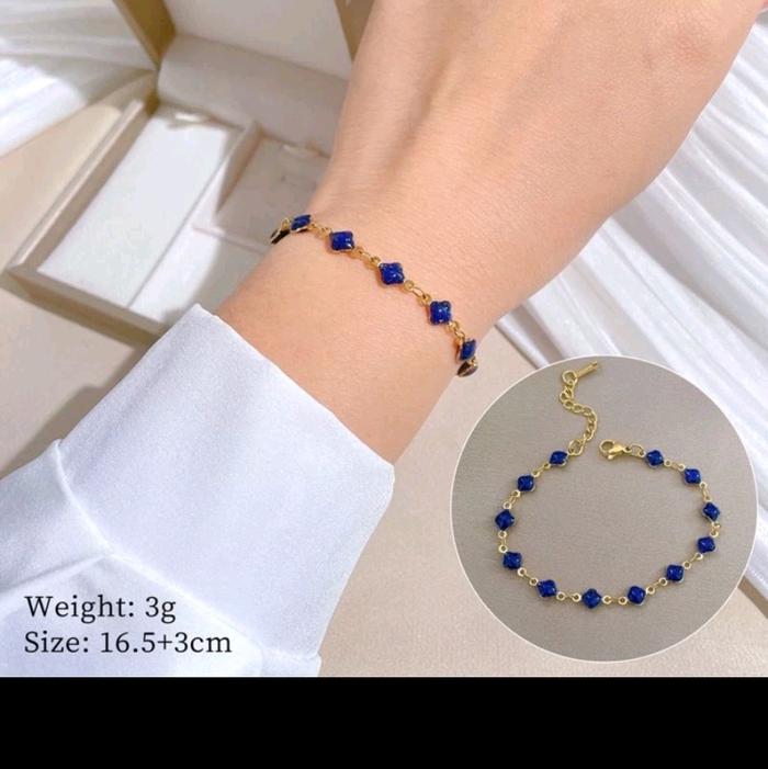 gelang titanium biru permata