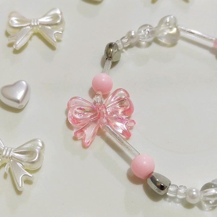 lovedt'ape pinkice (gelang yang terbuat dari manik yang dipadukan dengan pita,love, dan manik tabung