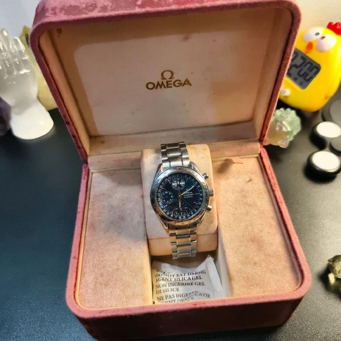 Omega Jam Tangan Pria Stainless Steel Chronograph dengan Tampilan Hitam dan Tali Logam