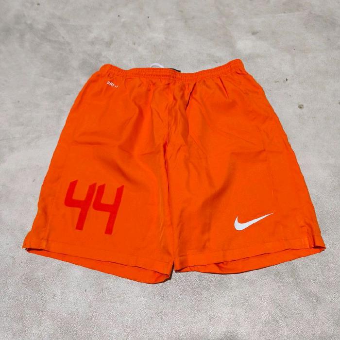 Celana olahraga bola nike orange bekas