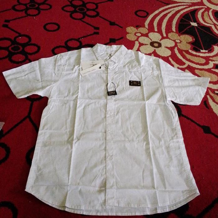 kemeja Calvin Klein putih logo plat besi Size on tag XL pemakaian L ,cek deskripsi ya