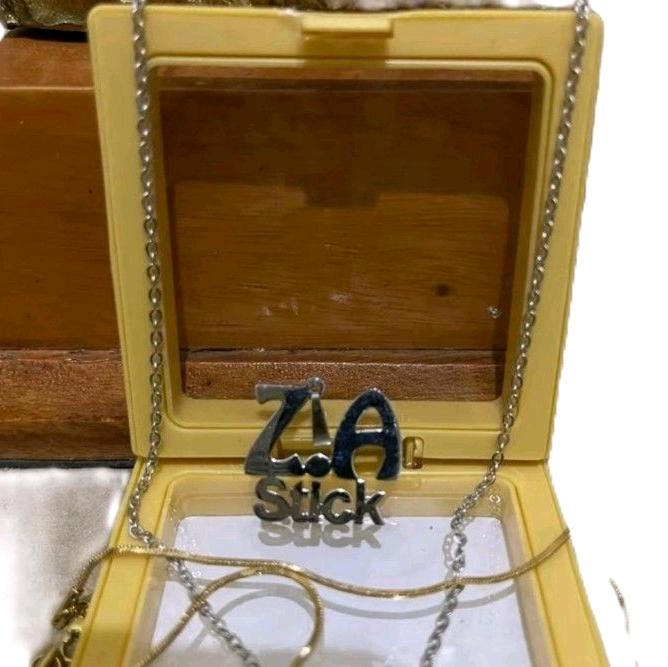 liontin titanium stick za-za bisa kustom nama Kalung