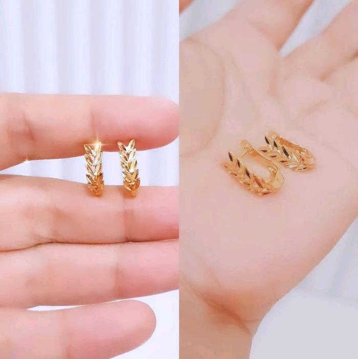 Anting jepit daun A 1526 rodhium jewelry NAILA PERHIASAN