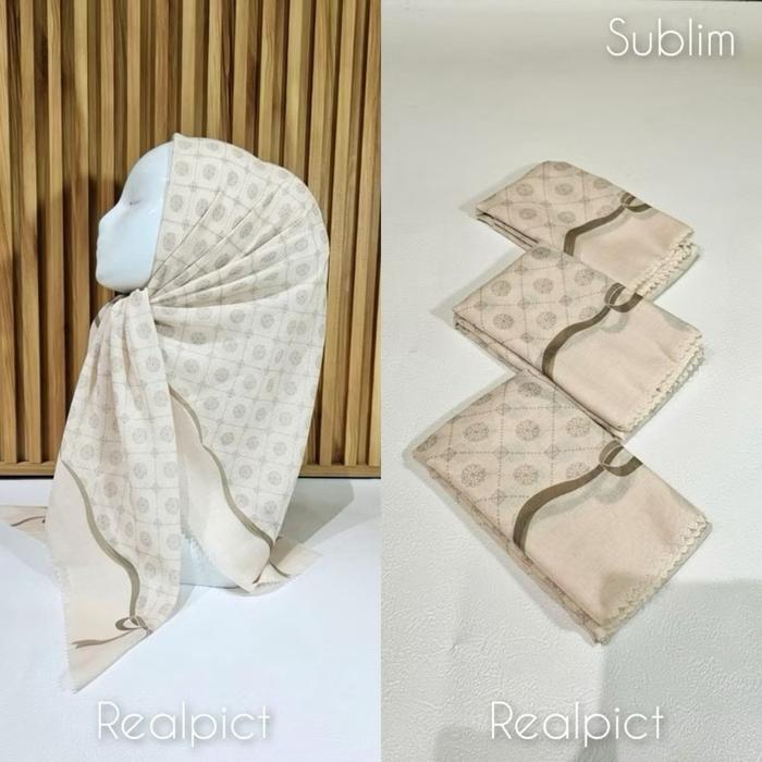 HIJAB SEGI EMPAT VOAL MOTIF ETNIK PITA WARNA IVORY KODE 404