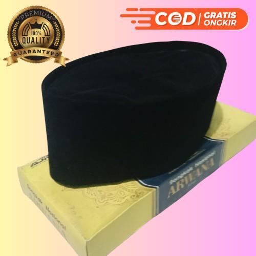 PECI POLOS HITAM MERK ARWANA SILVER Muslim