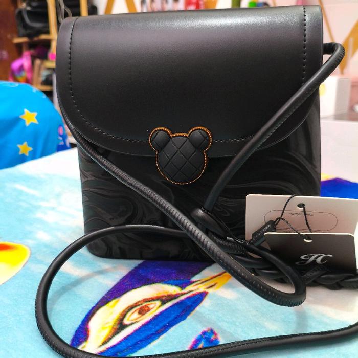 Tas slempang Jim'S Honey . .
