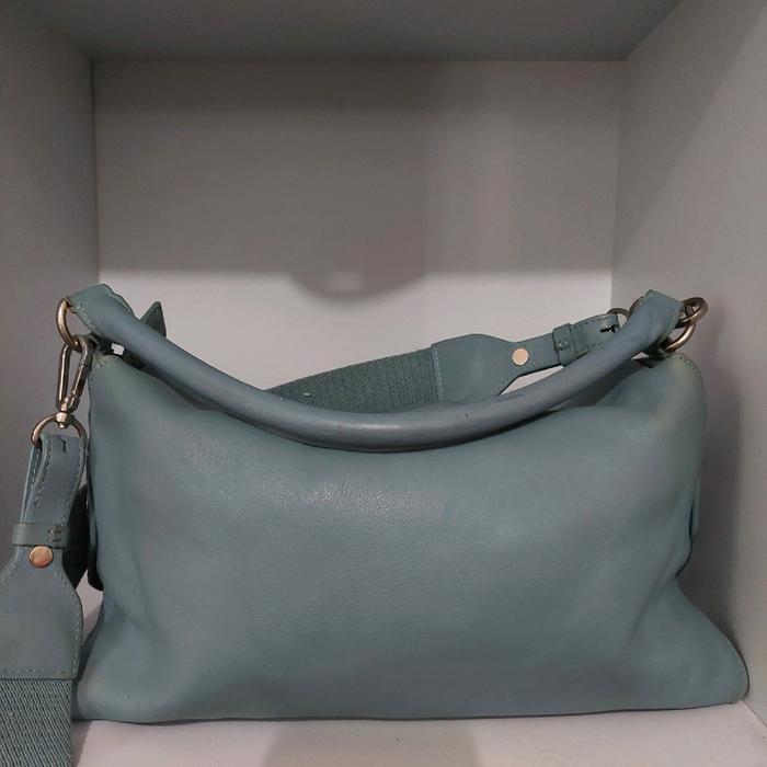 tas selempang biru telor asin