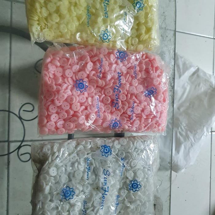 kancing baju / hem / kemeja 2 lubang Sun Flower