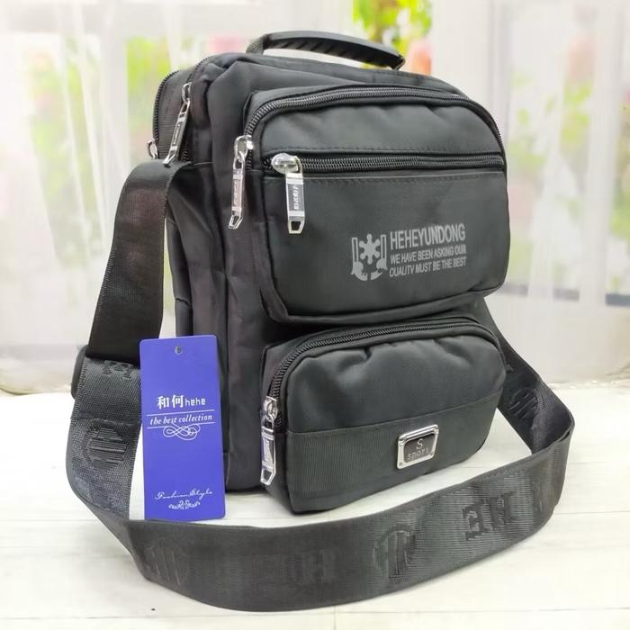 Tas selempang besar banyak ruang hehebag bahan awet nilon polister pria