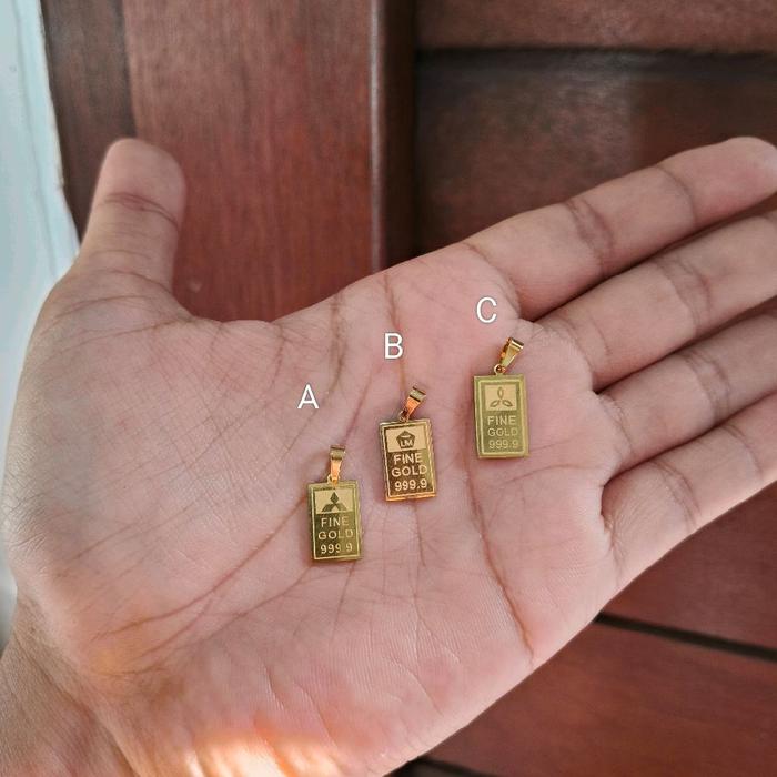 liontin fine gold titanium gold