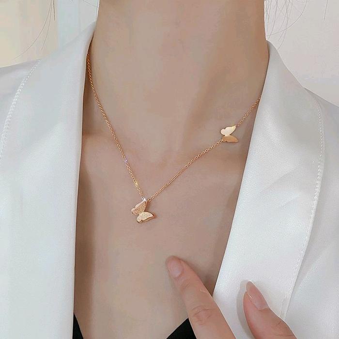 SK - kalung titnium kupu2 gold anti karat