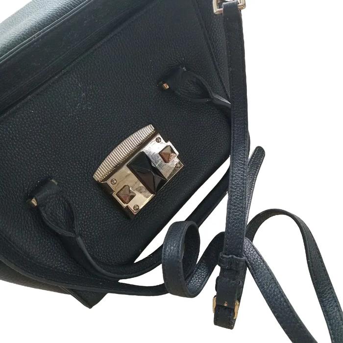 Tas wanita Merk DONINI original bahan kulit asli kondisi bekas seperti baru
