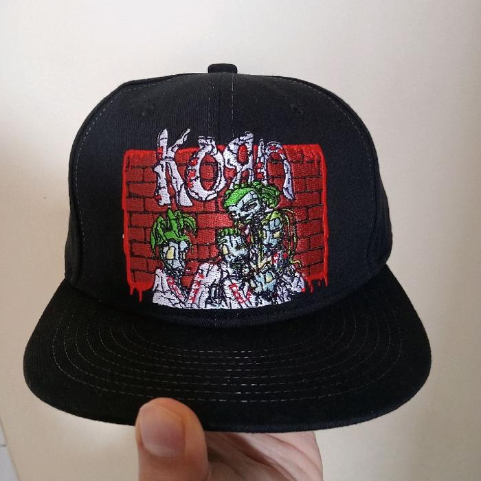 Topi band Korn merk Level Xero murah
