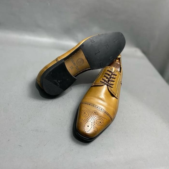Arden teal derby medallion brogue vibram