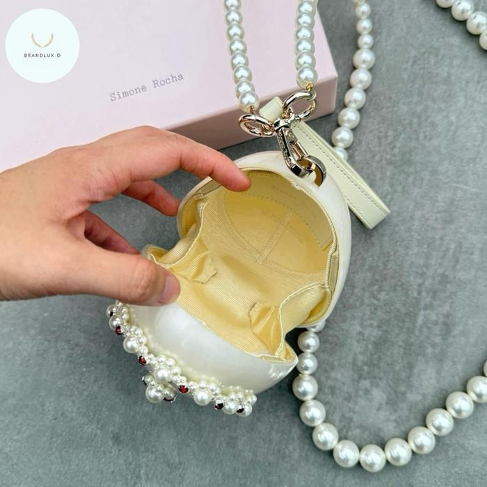 SIMONE ROCHA RED EMBELLISHED MICRO PEARL EGG BAG