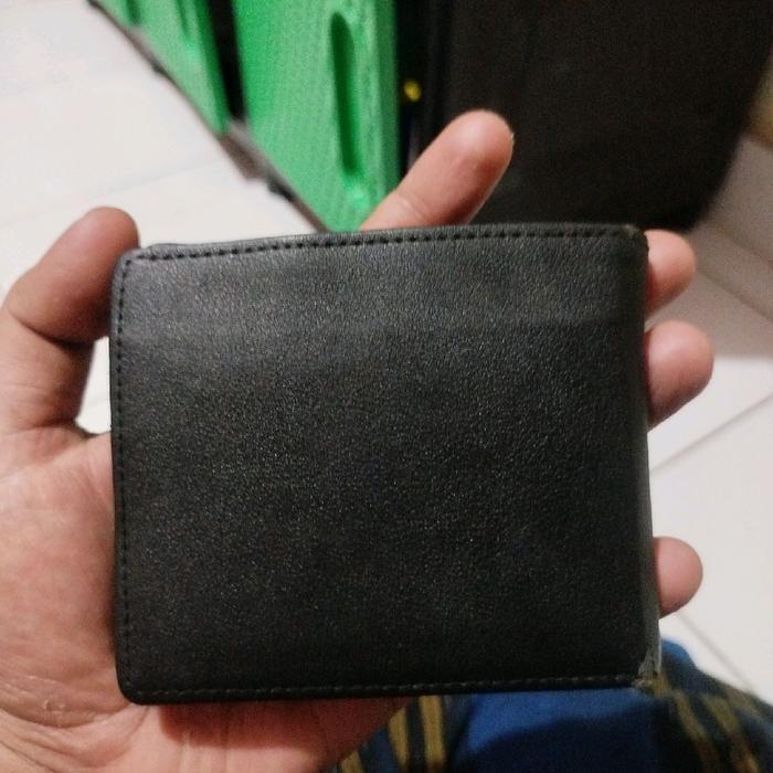 Dompet Isi Tuyul Kulit Asli Hitam dengan Desain Minimalis dan Fungsi Praktis untuk Pria