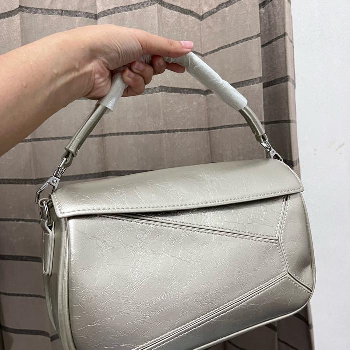 TAS ROYAL CUIR PUZZLE SILVER GOLD