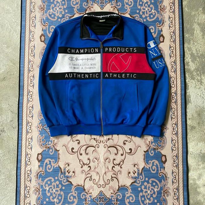 Champion Jaket Tracktop Vintage USA Biru dengan Desain Authentic Athletic dan Logo N.Y. USA