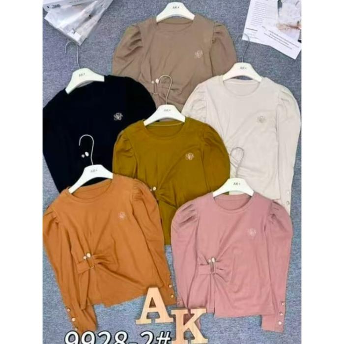 Ak bluse variasi Ring dan kancing Miring lengan puffy ld90-105 pb 55cm