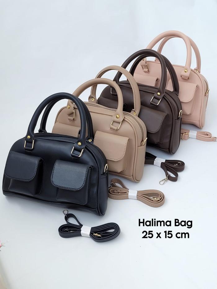 *Halima Bag* Bahan semi kulit polos. Tebal dan lentur. Aksesoris besi tebal warna gold. Dapat tali p