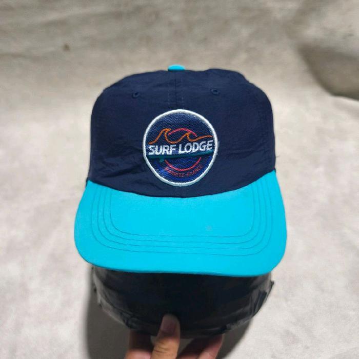 Topi olahraga surfing surf lodge navy biru bekas