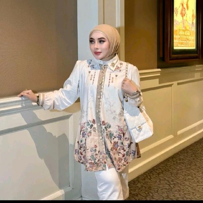 Tunik motif Oris Shellasaukia