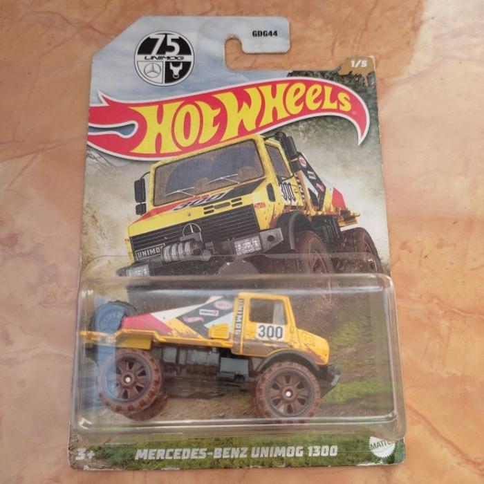 Hot Wheels MERCEDES BENZ UNIMOG 1300 Mud Runner kuning