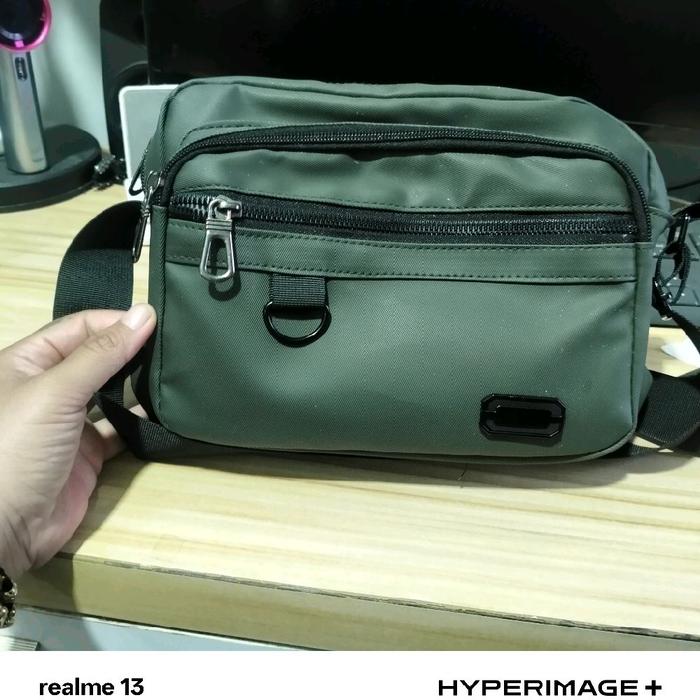 tas niceso warna hijau army unisex bahan tebal dan kokoh baru dipake beberapa kali belinya 79rb diju