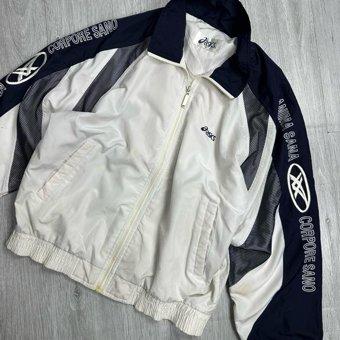 ASICS VINTAGE WINDBREAKER Jaket Pria dengan Desain Klasik dan Logo ASICS di Lengan