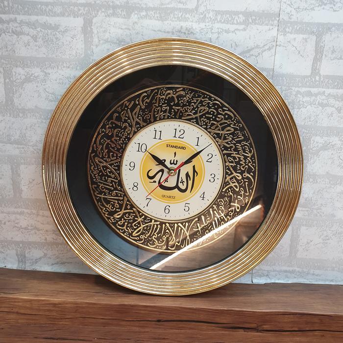 Jam dinding tulisan arab