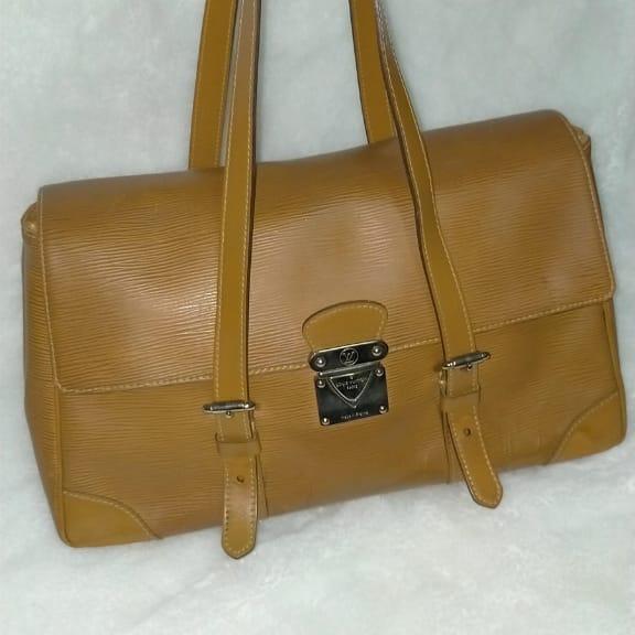 tas lv original asli