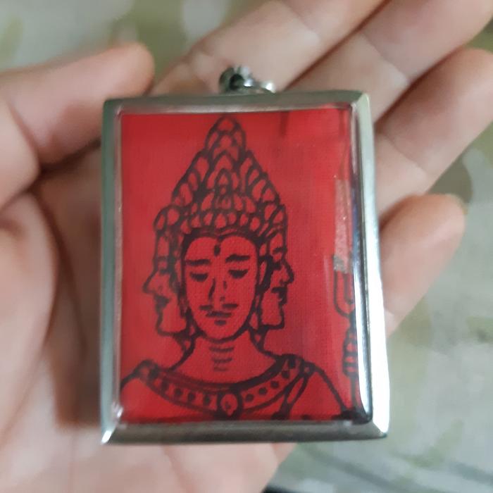 Liontin Yant 4 face Budha casing amulet.
