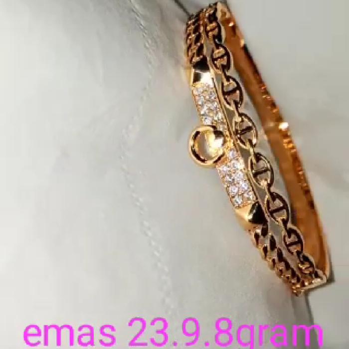 emas 23 karat