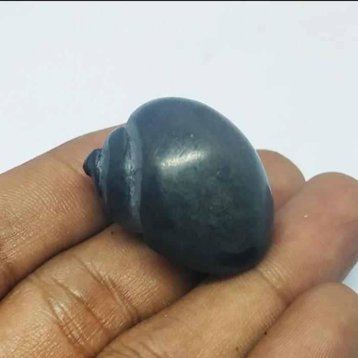 koleksi antik keong kol buntet hitam batu