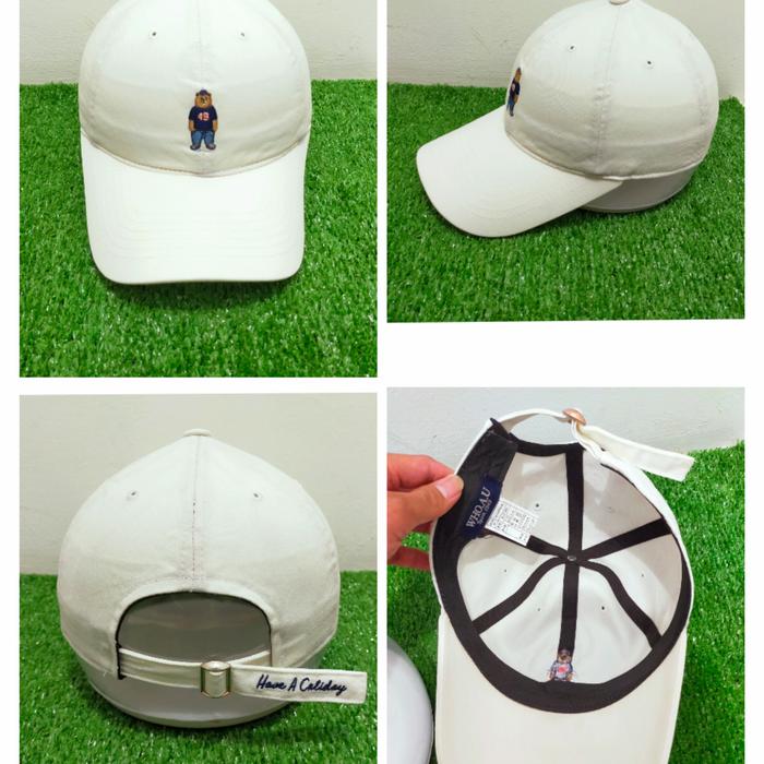 Topi who.au kartun beruang