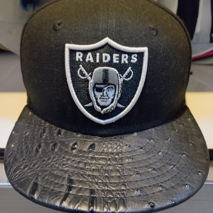 topi Raiders NFL
