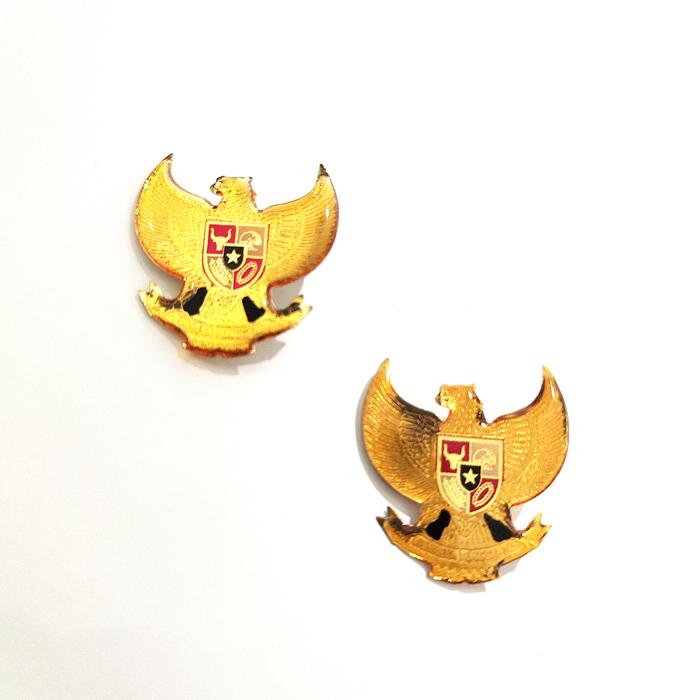 pin bros garuda emas kancing