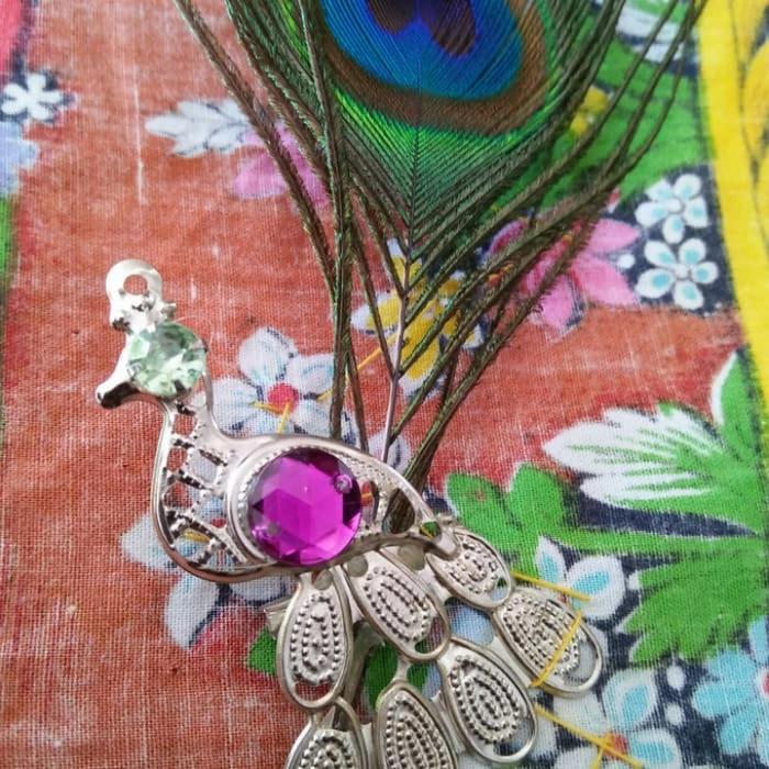bross burung alpaka n bulu merak asli