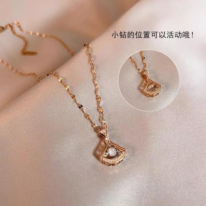 Kalung dancing stone/kalung titanium dancing stone impor anti karat