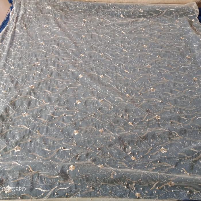 kain tile mutiara gliter motif