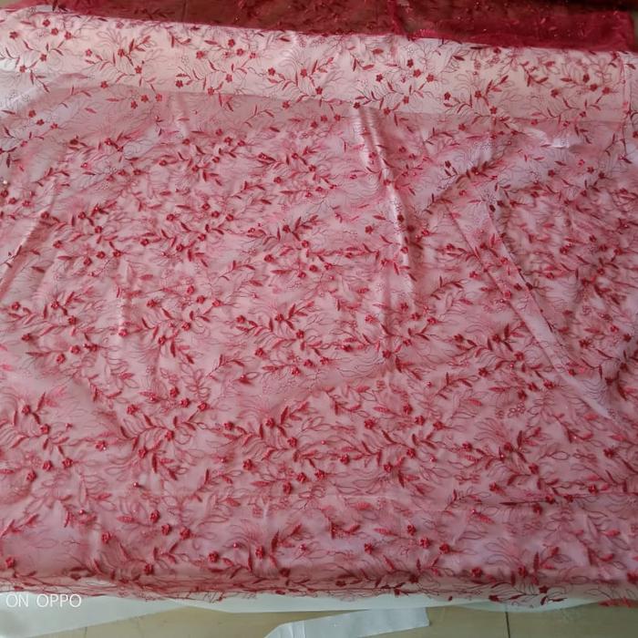 kain tile gliter dan mutiara motif